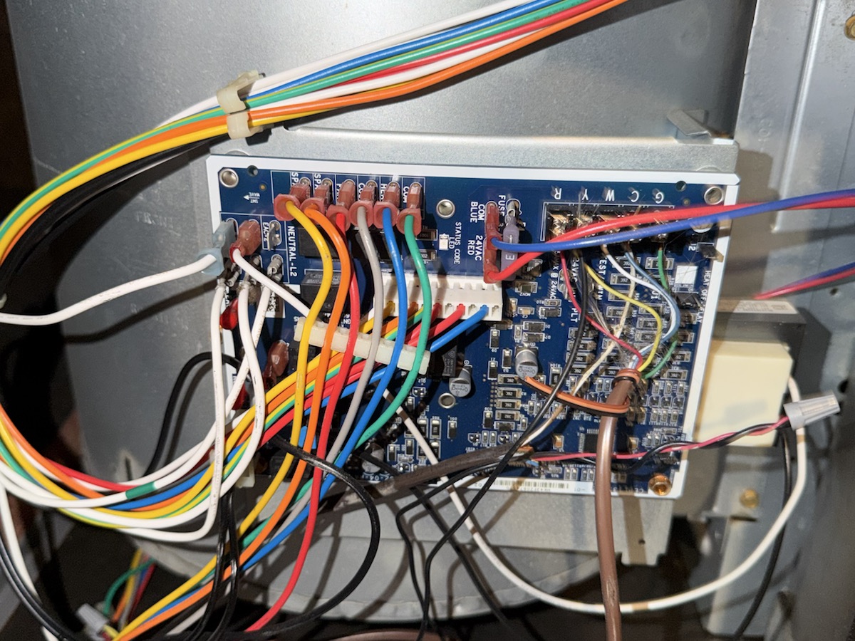 Neatly wired control board inside an air handler